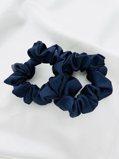 Everyday satin scrunchies are here!  Satin scrunchies are super gentle on the hair allowing for a stong hold with less damage than a traditional hair tie. The elastic is 3/8 inch elastic, allowing for a secure hold without the bulk! Each scrunchie is made to wrap around 3 times for a tight and secure hold, or 2 times for a more playful and loose style!  Every scrunchie is handmade by me, in my studio in Grand Rapids, Michigan! Lots of love and care goes into each product that I make!  Bundle up on other scrunchies using code 3FOR20 at checkout! Black XL sheer scrunchie: https://royaltybynatalie.etsy.com/listing/1580243458 Black XL satin scrunchie: https://royaltybynatalie.etsy.com/listing/1102468834 *all items are made in a smoke free, pet friendly home. Please keep that in mind when purch Navy Blue Hair, Essential Pouch, Satin Scrunchies, Pink Camouflage, Summer Snacks, Grand Rapids Michigan, Blue Gift, Fashion Hair, Loose Style