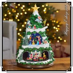 a small christmas tree on top of a wooden table