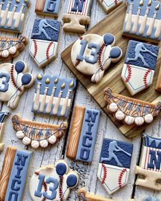 baseball themed cookies are arranged on a table