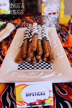 there are many donuts that are on the plate and ready to be eaten at this birthday party