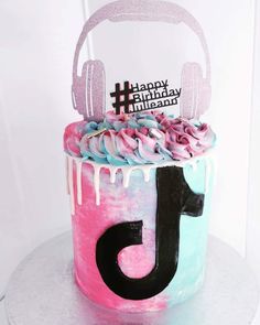 a birthday cake with headphones on top