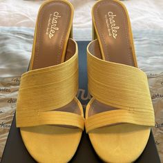 Charles By Charles David Yellow Slip On Sandals Yellow Sandals With 4-inch Heel For Summer, Chic Slip-on Heels For Vacation, Summer Slip-on Sandals With 4-inch Heel, Chic Yellow Mules With Open Heel, Chic Yellow Open Heel Mules, Spring Slip-on Sandals With Wrapped Heel, Yellow Open Toe Synthetic Mules, Yellow Open Heel Mules For Summer, Summer Slip-on Heels With Wrapped Heel