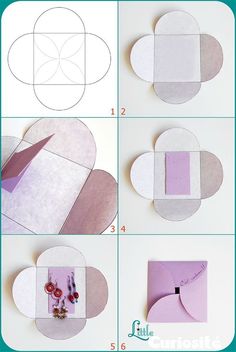 step by step instructions on how to make an origami heart with paper and scissors