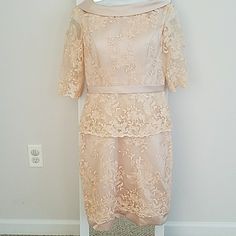 Size 2 Soft Pink Satin With Embroidered Overlay Detail. Light Boning In Bodice. Deep V At Back Of Dress. Very Pretty. Great For A Wedding Or Formal Event. Bust Has Lightly Molded Cups. Length Measures 36" Shoulder To Hem, Chest Measures 17" Armpit To Armpit. Waist Laying Flat Measures 29". Embroidered Mother Of The Bride Dress For Spring, Embroidered Dresses For Mother Of The Bride, Spring Floral Embroidery Mother Of The Bride Dress, Embroidered Knee-length Lace Wedding Dress, Floral Embroidered Mother Of The Bride Dress, Pink Satin, Embroidered Dress, Deep V, Formal Event