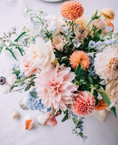 a bouquet of flowers sitting on top of a table