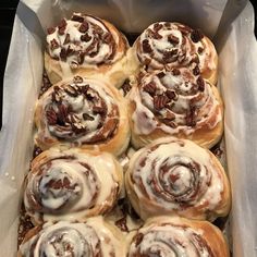 there are many cinnamon rolls in the box