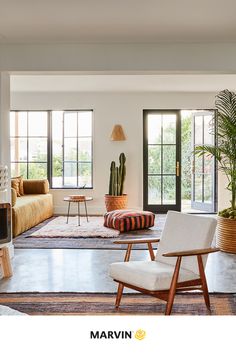 the living room is clean and ready for us to use it's natural wood accents