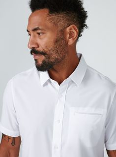 We created the perfect short sleeve button up, with the right mixture of comfort and style, just for you. Our performance shirts have 4-way stretch, are moisture wicking, wrinkle resistant and above all a great new addition to your wardrobe. The performance shirt will be your go-to for any occasion - day to night. This is a shirt that will have you satisfied at any given time. Details Model is 6'1" and wears a size medium. Care: Machine wash cold on delicate cycle with similar colors. Do not use Classic White Short Sleeve Dress Shirt, White Short Sleeve Classic Dress Shirt, White Short Sleeve Dress Shirt For Formal Occasions, White Short Sleeve Dress Shirt For Business Casual, White Short Sleeve Business Casual Dress Shirt, White Short Sleeve Dress Shirt For Work, Boulder Colorado, Stretch Shorts, Short Sleeve Button Up