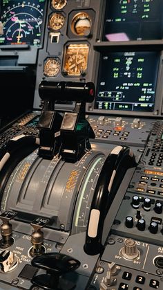 the cockpit of an airplane with multiple controls