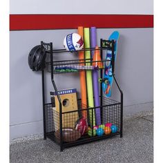 a black metal shelf with various items on it