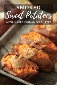 baked sweet potatoes with maple cinnamon butter on a baking sheet and text overlay reads smoked sweet potatoes with maple cinnamon butter