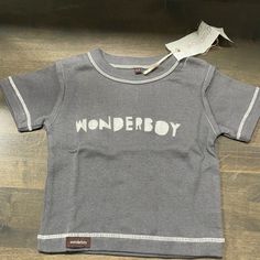 Never Worn Tags Attached Cotton Made In Usa Size 6-12 Months Smoke Free Home Gray Cotton Tops For Playtime, Silver Cotton Tops With Graphic Print, Silver Graphic Print Cotton Top, Silver Cotton Top With Graphic Print, Sleeve Cotton, Kids Shirts, Cotton T Shirt, 12 Months, Clothing Brand