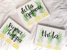 three pineapple coasters with the words delta and delta on them, sitting on a white sheet