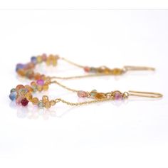 Multi Sapphire Dangle earrings to make a statement with your look. These earrings create a sparkling, luxurious look featuring drop cut gemstone. Lightweight and gorgeous, these are a great bridesmaid, wedding or christmas gift for anyone on your list. If you love to gravitate towards unique styles, this piece of jewelry is perfect for you.  PRODUCT DETAILS :-  > Material - 18K Solid Yellow Gold > Gemstone - Multi Sapphire  > Gemstone Weight - 13.96 ct > Gemstone Shape - Drop > Gemstone Size - 5 Elegant Multicolor Beaded Earrings, Elegant Wedding Earrings With Gemstone Beads, Elegant Gemstone Beads Drop Earrings, Elegant Gemstone Beads Dangle Earrings, Elegant Dangle Earrings With Gemstone Beads, Elegant Faceted Beaded Drop Earrings, Elegant Long Drop Gemstone Bead Jewelry, Elegant Multicolor Long Drop Beaded Earrings, Earrings To Make