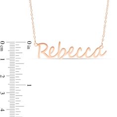 Your look isn't complete without this elegant personalized necklace. Crafted in sterling silver with 10K rose gold plate, this style features your name - from two to eight characters in length - sculpted in a cursive script font. Polished to a bright shine, this design suspends centered along a 16.0-inch rolo chain that secures with a spring-ring clasp. Custom Nameplate Necklace In Rose Gold, Custom Rose Gold Nameplate Necklace With Name, Rose Gold Nameplate Necklace For Personalized Gift, Rose Gold Nameplate Necklace With Hallmarks, Elegant Rose Gold Necklaces With Names, Elegant Rose Gold Necklace With Names, Custom Name Rose Gold Nameplate Necklaces, Customizable Sterling Silver Rose Gold Name Necklace, Custom Name Rose Gold Nameplate Necklace