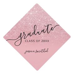 a pink and white graduation sticker with the words graduate on it