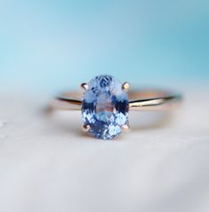 Blue Sapphire Engagement Ring. Sky Blue Sapphire 2.14ct Oval | Etsy Oval Solitaire Sapphire Ring In Rose Gold, Rose Gold Oval Sapphire Solitaire Ring, Oval Rose Gold Solitaire Sapphire Ring, Oval Rose Gold Sapphire Solitaire Ring, Peach Sapphire Rings, Wedding Ring Finger, Graff Diamonds, Gold Ring Engagement, Light Blue Sapphire