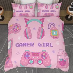 a pink bed with headphones and games on it