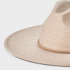 Give your hat collection a chic, versatile update with this Wide-Brim Fedora Hat from Universal Thread™. Made from woven recycled polyester fabric, this fedora hat is designed with a wide brim that measures 22.5 inches in circumference. Great for accenting a wide variety of outfits, it also offers an adjustable fit with the hook-and-loop fastener. Universal Thread™: Found exclusively at Target. Lightweight Fedora With Curved Brim, Lightweight Wide Brim Beige Fedora, Lightweight Beige Fedora With Short Brim, Lightweight Beige Fedora With Flat Brim, Casual Beige Wide Brim Felt Hat, Beige Casual Panama Hat For Fall, Casual Beige Panama Hat For Fall, Lightweight Fedora Hat, Casual Panama Hat With Curved Brim For Winter