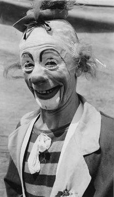 an old photo of a creepy clown