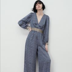 Wrap-Front V-Neck Jumpsuit With Long Sleeves. Contrast Waist And Cuff Detail. Front Pockets. Wide Leg. Back Hidden In-Seam Zip Closure With Opening And Lined Button. Brand New With Tags. L: Armpit To Armpit 22” Length 54”, Full Waist 30” Chic V-neck Pantsuit For Party, Fall Evening V-neck Pantsuit, V-neck Jumpsuits And Rompers For Date Night In Fall, Chic Blue V-neck Pantsuit, Chic V-neck Pantsuit For Night Out, Elegant Long Sleeve Jumpsuits And Rompers By Zara, Chic Zara V-neck Jumpsuits And Rompers, Chic Zara Jumpsuits And Rompers, Zara Long Sleeve Jumpsuit For Party