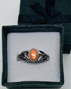 Ring for Cremation Ashes= The band is sterling silver Celtic infinity with a 4 X 6mm Stone Hello My Name is Chandra, I'm honored to help you design your Cremation Jewelry to honor your loved ones. Turning cremation ashes into a beautiful Cremation Ring that holds your cherished memories and unbreakable bond close to your heart always. Each Cremation ring is handcrafted with utmost respect, care and love.  ⭐️Please make sure you order the right size because after your Ashes Ring is completed ther Memorial Jewelry Ashes, Ashes Ring, Cremation Ring, Cremation Ashes, Cremation Jewelry, Memorial Jewelry, Hello My Name Is, Cherished Memories, Etsy Accessories