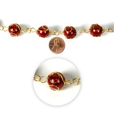 The hildie & jo Gold Wire Wrapped Round Red Pearl Glass Strung Beads will lend a stylish touch to your jewelry - making projects These pearls flaunt red and gold tones giving them an exquisite look Team them with beads in coordinating hues to create bracelets, necklaces, earrings and more Choose from a range of exotic, handcrafted beads from hildie & jo to create trendy jewelry piecesBrand: hildie & joLength: 7 inchesContent: Glass (Bead) & Metal (Wire) Purse Crafts, Pandora Beads, Strung Beads, Jewelry Making Project, Wire Necklace, Wire Work Jewelry, Work Jewelry, Upcycled Jewelry, Gold Wire