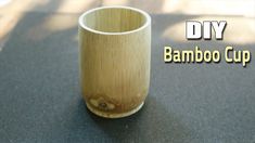 a bamboo cup sitting on top of a table