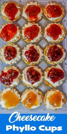 cheesecake phyllo cups with jelly on top in an ice tray, ready to be eaten