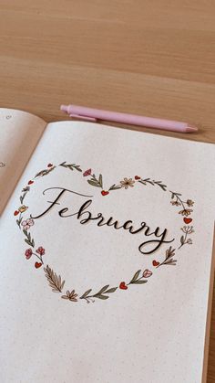 an open notebook with the word february written in it