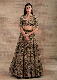 Choose a royal touch with this Pesto Green lehenga Shringarmati from Jannat Collection Are you struggling with the thought of what to wear on your special occasions? Look no further than this super-stylish pesto green color lehenga. This outfit is the game-changer that looks regal, royal and splendid. The most impressive thing about this lehenga is that it looks heritage, traditional and glamorous at the same time. Pepped up with Dori and gotta embroidery work, this lehenga will make you look li Elegant Meenakari Lehenga, Elegant Fitted Meenakari Choli, Fitted Meenakari Traditional Wear For Wedding, Elegant Semi-stitched Lehenga With Meenakari Details, Elegant Art Silk Lehenga With Meenakari Detailing, Fitted Meenakari Wedding Choli, Fitted Meenakari Choli For Wedding, Elegant Meenakari Art Silk Lehenga, Fitted Meenakari Anarkali Set For Wedding