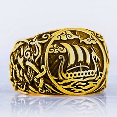 Drakkar Viking Ship Ring - Bronze, Sterling Silver or 14k Gold Please allow an extra 2-3 weeks for gold option. Material Options: Bronze, 925 Sterling Silver or 14k Gold.Approx. Weight: 14 grams, depending on size. Gold option is heavier.Sizes Available: 5, 6, 7, 8, 9, 10, 11, 12, 13, 14 and 15. Worldwide shipping available!US Customers: Typically ships in 1 business day, delivers in 2-5 days.Outside of US: See shipping options during checkout.Share on social media: Gold Viking Style Jewelry, Handmade Viking Gold Jewelry, Silver Viking Bracelet Engraved, Mens Gemstone Rings Viking, Bronze Viking Jewelry Collectible, Viking Ship, Bronze Color, Vikings, Sterling Silver Rings