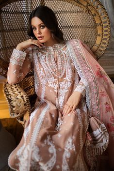 Light Peach Lawn Kameez Salwar Pakistani Party Wear comes in an Embellished Center Panel, Side Panels, Embroidered Sleeves, Embroidered Sleeves Border, Lace Neckline, Lace Patches for Slits, and Lace Borders. It is paired with Embroidered Net Dupatta, Embroidered Dupatta Length Border, and Embroidered Dupatta Pallu Border, it has Plain Dyed Back, paired with Plain Dyed Trouser Detailed Description: SKU: PN227 Detailing: Embroidery, Threads, Floral designs Color: Light Peach Fabric: Lawn Design: Summer/fall Outfits, Dupatta Top, Sobia Nazir, Side Border, Printed Organza, Lawn Design, Clothing Studio, Pakistani Party Wear, Lawn Dress