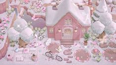 a pink house surrounded by lots of white and pink decorations on top of a snow covered ground