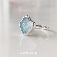 Freeset Raw Aquamarine Ring ►Made of solid sterling silver with Shiny finish (950) ►Featuring the beauty of Vietnamese Aquamarine Stone: Aquamarine Color: Blue Shape: Raw Carat Weight: 3 ct. (approx.) Gemstone creation: 100% Natural Hardness: 8-8.5 ♥ Our Aquamarine will be of much better quality and clarity for a price we sell as compared to others since we make our own gemstone and pick the best ones to set in the jewelry , If you already have an Aquamarine jewelry you will know what we are tal Ocean-inspired Sterling Silver Jewelry For Anniversary, Ocean-inspired Sterling Silver Rings, Handmade Silver Rings With Ocean-inspired Style, Vintage Aquamarine Ring, Aquamarine Ring Vintage, Aquamarine Color, Raw Aquamarine, Aquamarine Colour, Aquamarine Jewelry