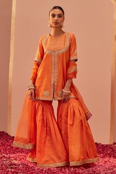 Buy Orange Kurta And Gharara Silk Chanderi Hand Block Printed Mughal Suhair Set For Women by Sheetal Batra Online at Aza Fashions. Orange Sets With Resham Embroidery In Traditional Drape, Orange Resham Embroidery Sets For Navratri, Orange Designer Wear Sets With Traditional Drape, Orange Resham Embroidery Lehenga, Orange Wedding Sets With Dupatta, Designer Orange Sets With Dupatta, Festive Orange Set With Dupatta, Orange Sharara With Resham Embroidery In Traditional Drape, Orange Traditional Drape Sets With Zari Work