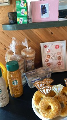 doughnuts and other condiments on a table