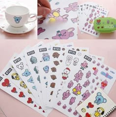 various stickers are placed on top of each other next to a cup and saucer