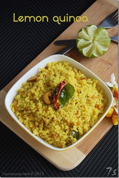 there is a dish with rice and vegetables in it on the table next to a knife