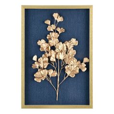 a gold flower in a frame on a blue background