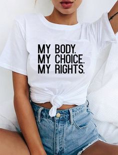 "Feminist T-shirt My Body My Choice My rights Women's Rights Cool Feminism Tee AVAILABLE SIZES: S,M,L,XL,2XL,3XL COLOR: WHITE, BLACK, HEATHER GREY CONDITION: BRAND NEW T-SHIRT SPECS : 100% high quality pre-shrunk cotton (165 g/m2) jersey). Taped neck and shoulders, twin needle stitching, seamless collar. PRINT: Highest quality print - not cheap \"iron-on\" transfers! MEASUREMENTS : width - armpit to armpit ; length - the body length is measured in a straight line from the highest point of the sh Feminist Tshirt, Feminist Shirt, Women's Rights, Shirt Print Design, Tee Shirt Designs, Womens Rights, Mom Shirts, Cute Shirts, Cool T Shirts