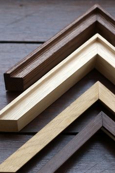 four different wood frames laying on top of each other