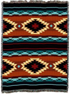 a colorful blanket with fringes on it