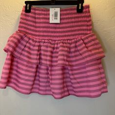 Striped Skirt New With Tags Size Large Pink Mini Skort With Elastic Waistband, Pink Elastic Waistband Mini Skort, Summer Striped Lined Skort, Striped Lined Skort For Summer, Trendy Pink Ruffled Skort, Casual Pink Ruffled Skort, Striped Mini Skort For Spring, Spring Striped Mini Skort, Trendy Striped Mini Skirt For Summer