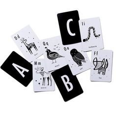 black and white alphabet cards with animals, birds, and letters arranged in the same pattern