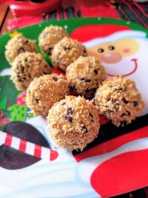 some cookies are sitting on a plate with santa's stocking