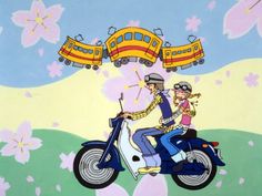 a man and woman riding on the back of a scooter in front of flowers