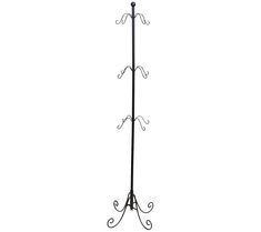 a black metal coat rack with three hooks