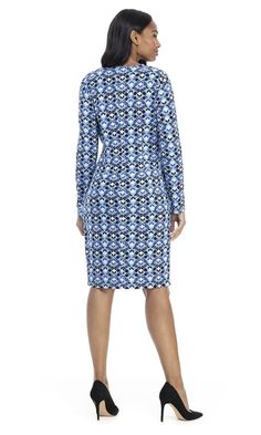 Make this London Times T4810M faux wrap dress a bold addition to your wardrobe. Stuns with geometric print, this jersey fabric dress showcases a pair of slender long sleeves and a surplice V-neckline bodice, with gathered side and a silver metal accent. The wrap skirt columns down in sheath silhouette and finishes at above the knee length. Look sophisticated and mature in this chic London Times creation. Style: imap_T4810M Details: Jersey, Long Sleeve, Surplice bodice, Enclosed back, Hidden back Spring Long Sleeve Dresses With Flattering Silhouette, Spring Midi Dress With Flattering Silhouette And Long Sleeves, Fitted Long Sleeve Dress For Daywear, Casual Long Sleeve Fitted Dress For Daywear, Fitted Knee-length Long Sleeve Day Dress, Fitted Long Sleeve Knee-length Dress For Daywear, Fitted Knee-length Long Sleeve Dress For Daywear, Jersey Fabric Dress, Evening Maxi Dresses