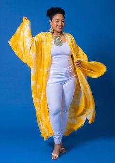 Experience the vibrant energy of summer with our Yellow Tie Dye kimono! Made with breathable fabric, this one-size-fits-most piece is perfect for any occasion. Versatile and comfortable, it's your go-to for effortless style all season long. Spring Cotton Kimono For Beach Cover-up, Long Spring Loungewear Cover-up, Oversized Fall Cover-up For Vacation, Casual Spring Cover-up With Kimono Sleeves, Free Size Kaftan For Spring Beach Cover-up, Chic Spring Loungewear Kimono, Oversized Open Front Cover-up For Loungewear, Chic Flowy Kimono For Loungewear, Spring Wrap Robe For Beach Cover-up